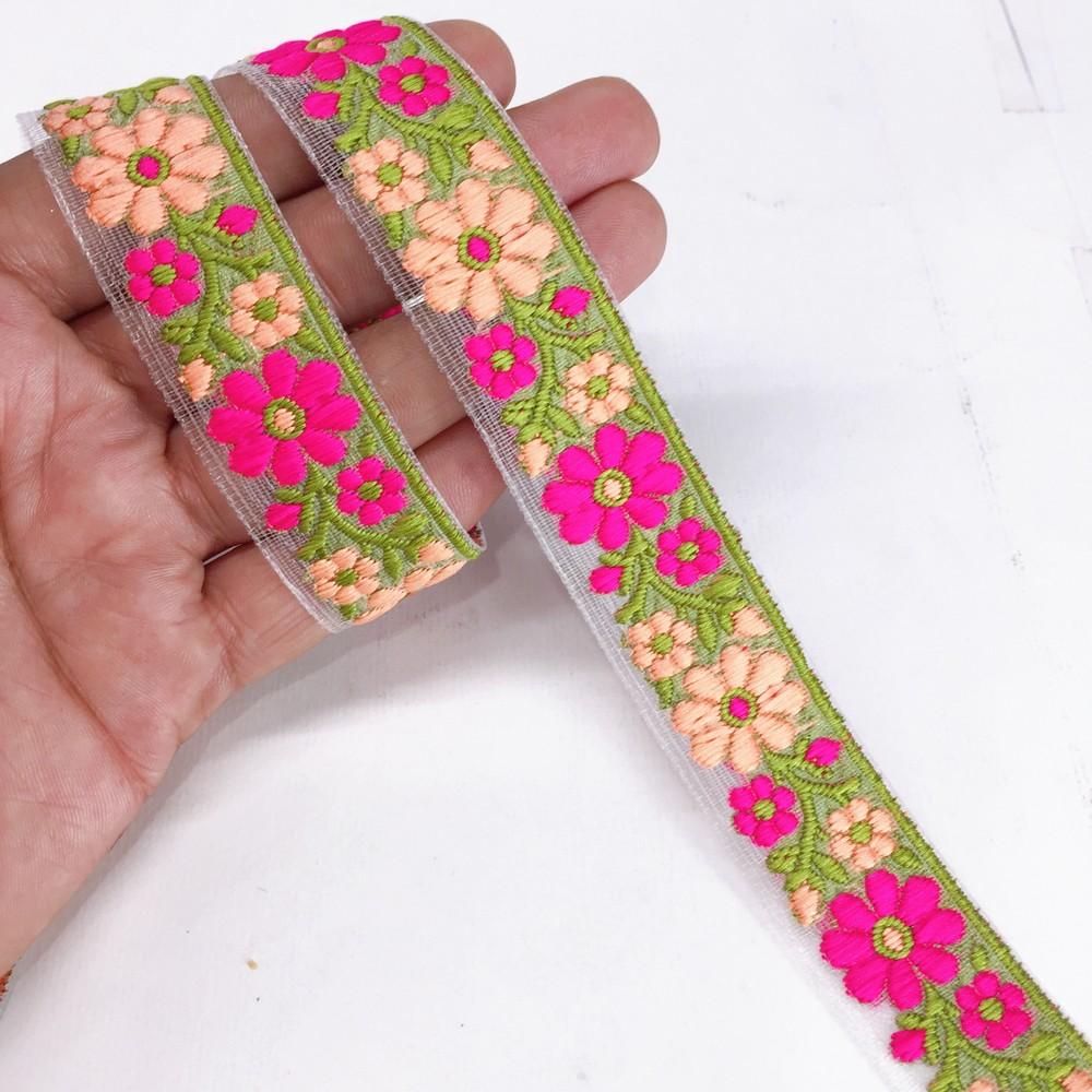 20mm Organza back flower creeper Jacquard trim, shown on white cotton