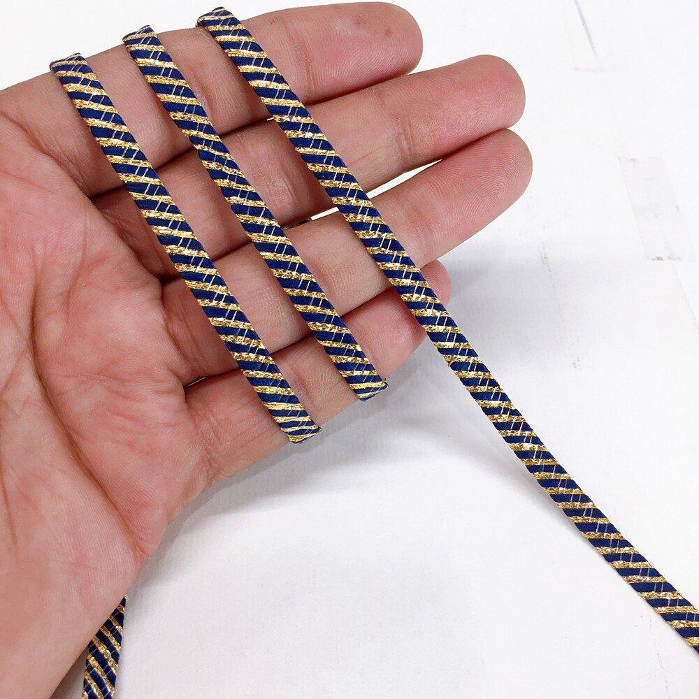 5mm Knitted Decorative Ribbon, shown on white cotton