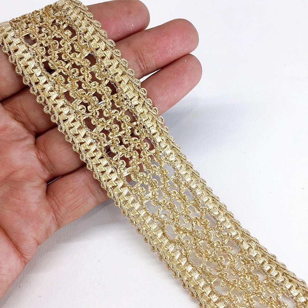 35mm Anmol Knitted Decorative Ribbon, shown on white cotton