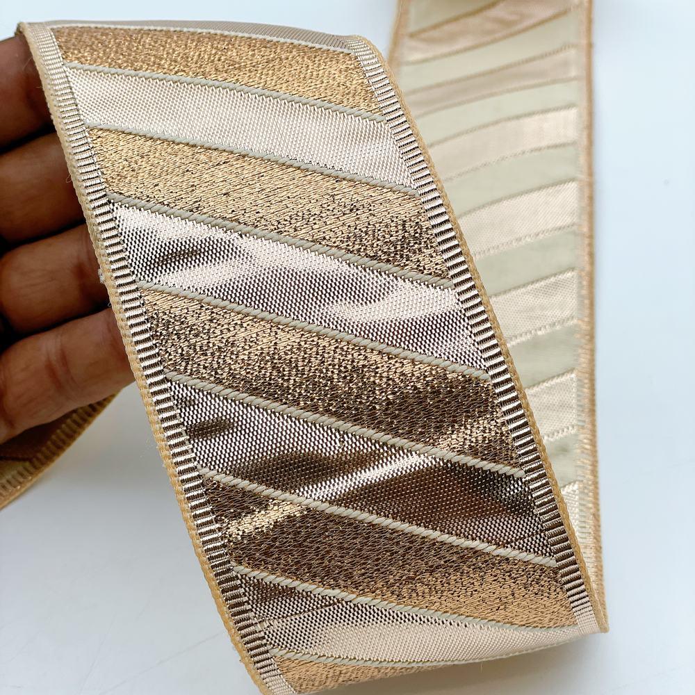 60mm Wide Gota Work Jacquard Ribbon - Metallic Diagonal Stripe Border Lace, shown on white cotton