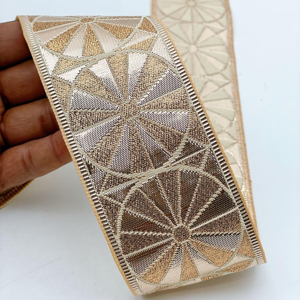 60mm Wide Gota Work Jacquard Ribbon - Metallic Geometric Floral Lace, shown on white cotton