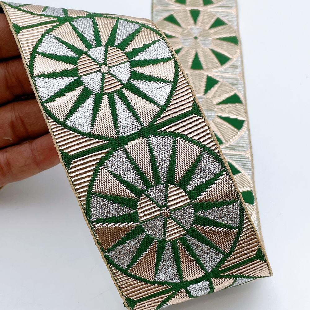 60mm Wide Colorful Sunburst Gota Work Jacquard Ribbon - Woven Border, shown on white cotton