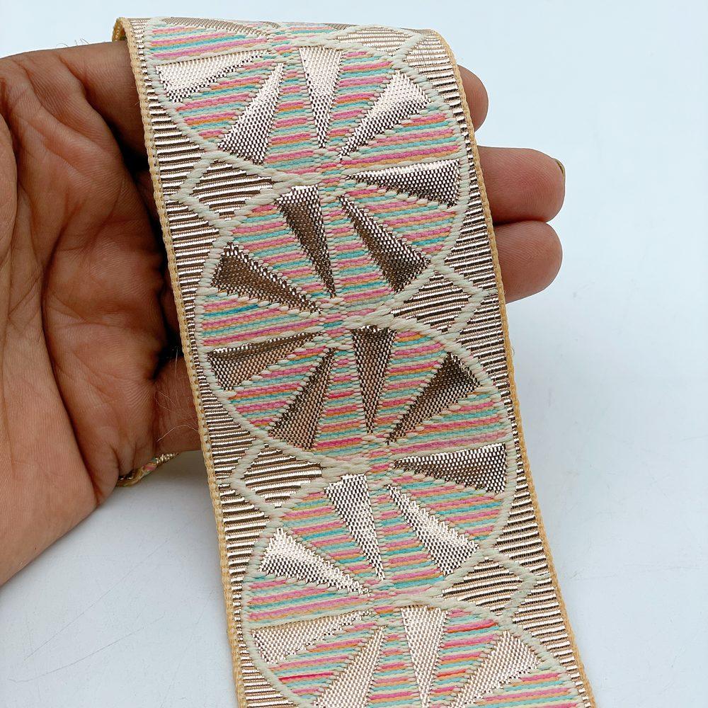 60mm Wide Gota Work Jacquard Ribbon - Metallic Fan Motif Border Lace, shown on white cotton
