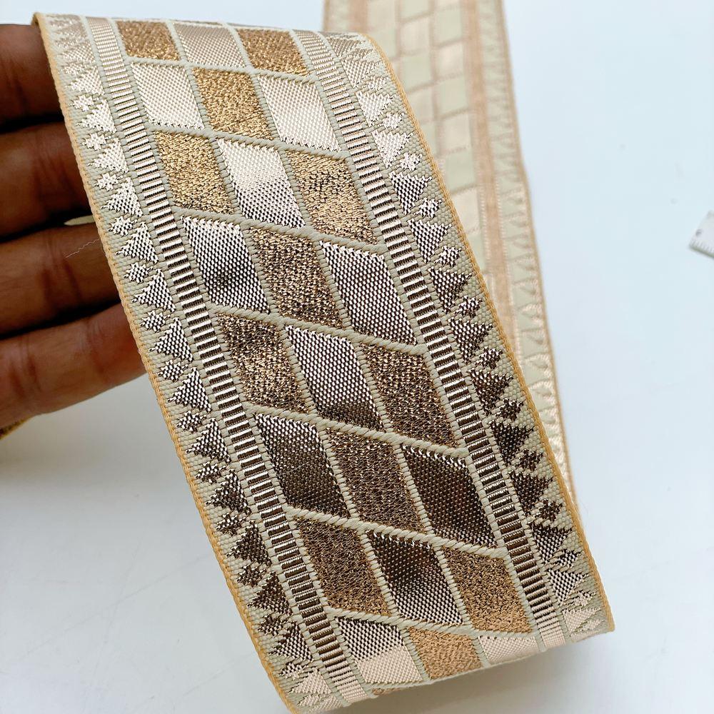 60mm Wide Gota Work Jacquard Ribbon - Metallic Diamond Motif Border Lace, shown on white cotton