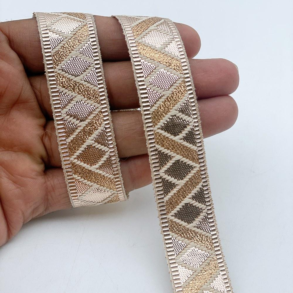 20mm Wide Gold Gota Work Jacquard Ribbon - Diamond & Wavy Stripe Border Lace, shown on white cotton