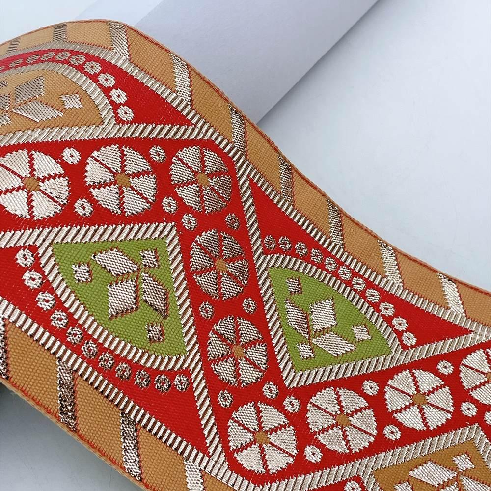 100mm Indian Gota Jacquard Ribbon Trim - Metallic Woven Tapestry Border for Ethnic Wear and Crafts, shown on white cotton