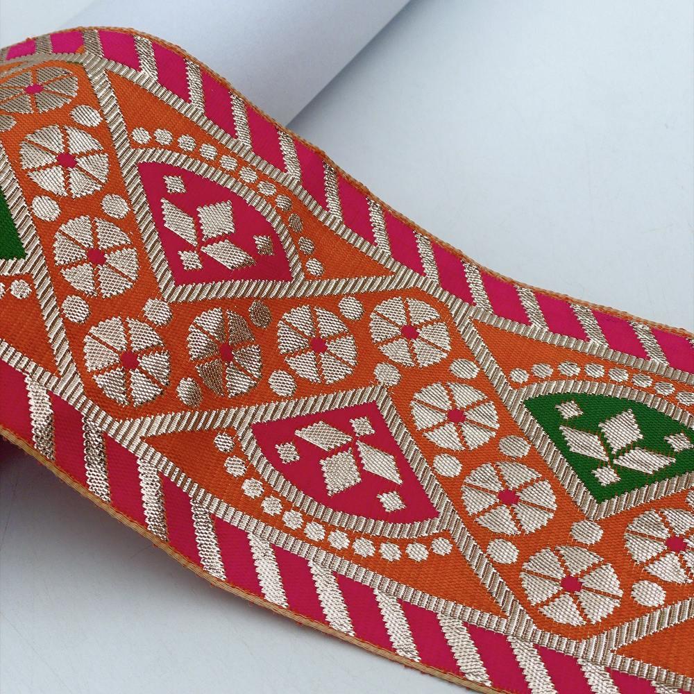 100mm Indian Gota Jacquard Ribbon Trim - Metallic Woven Tapestry Border for Ethnic Wear and Crafts, shown on white cotton