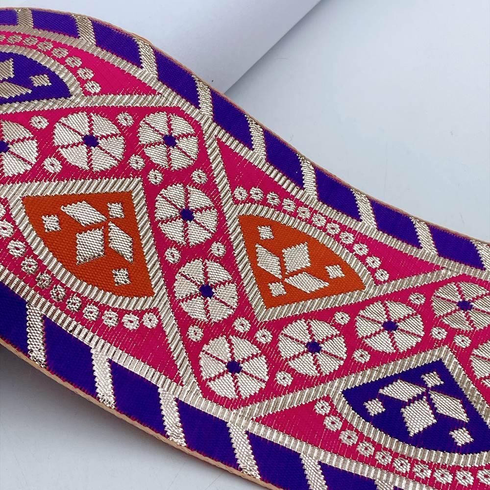 100mm Indian Gota Jacquard Ribbon Trim - Metallic Woven Tapestry Border for Ethnic Wear and Crafts, shown on white cotton