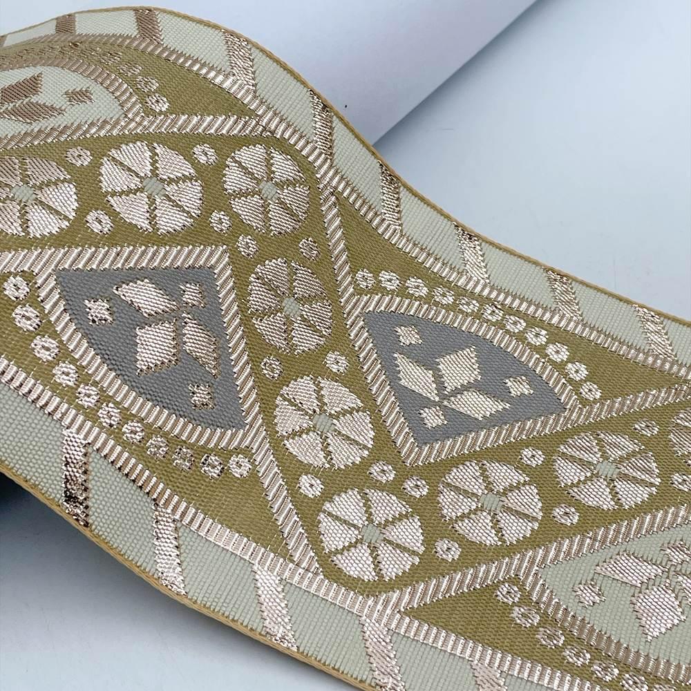 100mm Indian Gota Jacquard Ribbon Trim - Metallic Woven Tapestry Border for Ethnic Wear and Crafts, shown on white cotton