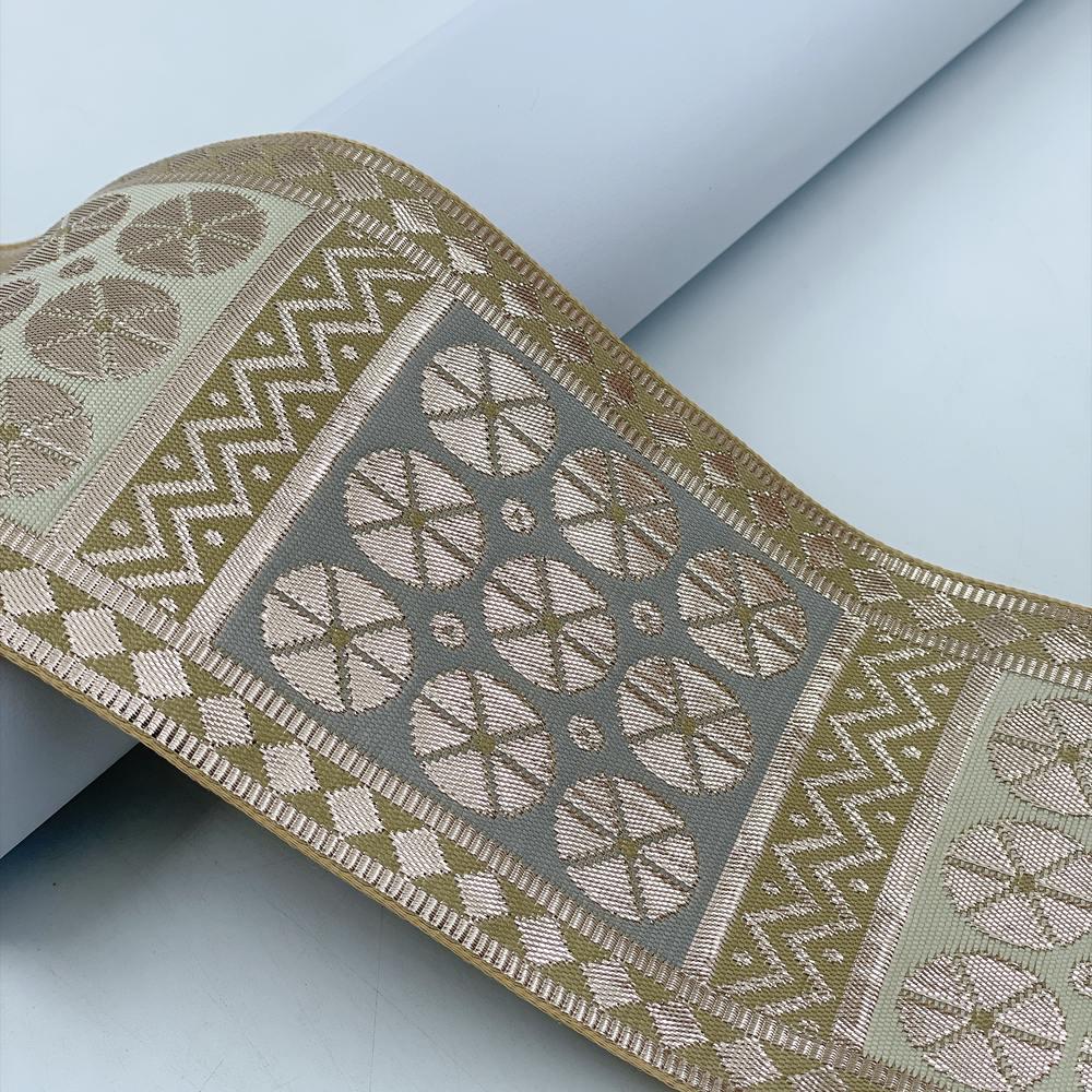 100mm Indian Gota Jacquard Ribbon Trim - Metallic Silver Woven Border for Saree, Lehenga, and Ethnic Wear, shown on white cotton