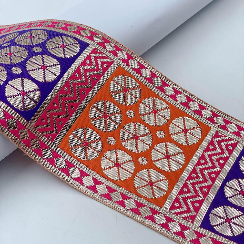 100mm Indian Gota Jacquard Ribbon Trim - Metallic Silver Woven Border for Saree, Lehenga, and Ethnic Wear, shown on white cotton