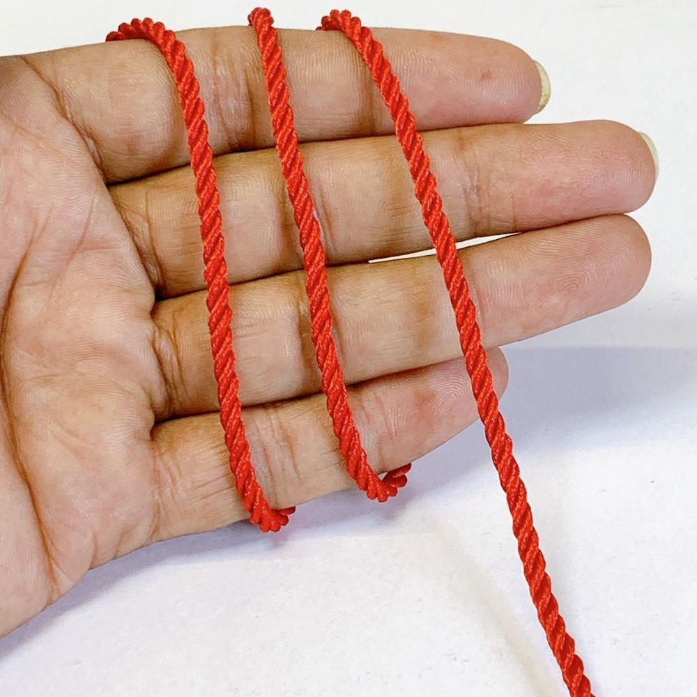 3mm Shiny Twisted Dori Cord - Multicolor Decorative Rope Trim for Apparel, Jewelry, and Macrame, shown on white cotton