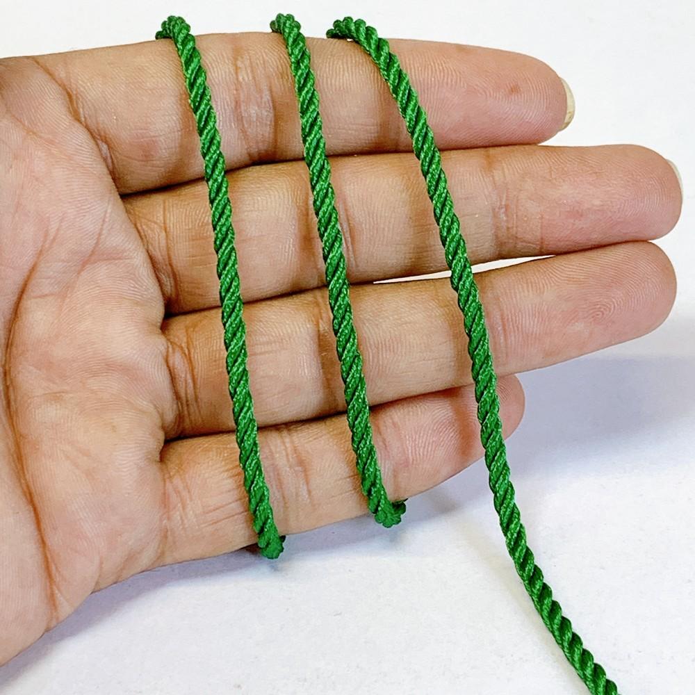3mm Shiny Twisted Dori Cord - Multicolor Decorative Rope Trim for Apparel, Jewelry, and Macrame, shown on white cotton