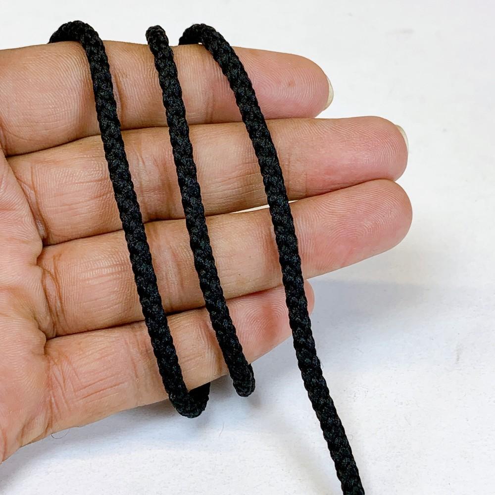 4mm Indian Braided Dori String - Multicolored Drawstring Cord for Ethnic Wear, Latkans, and Tassels, shown on white cotton