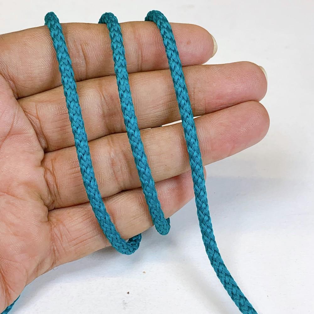 4mm Indian Braided Dori String - Multicolored Drawstring Cord for Ethnic Wear, Latkans, and Tassels, shown on white cotton