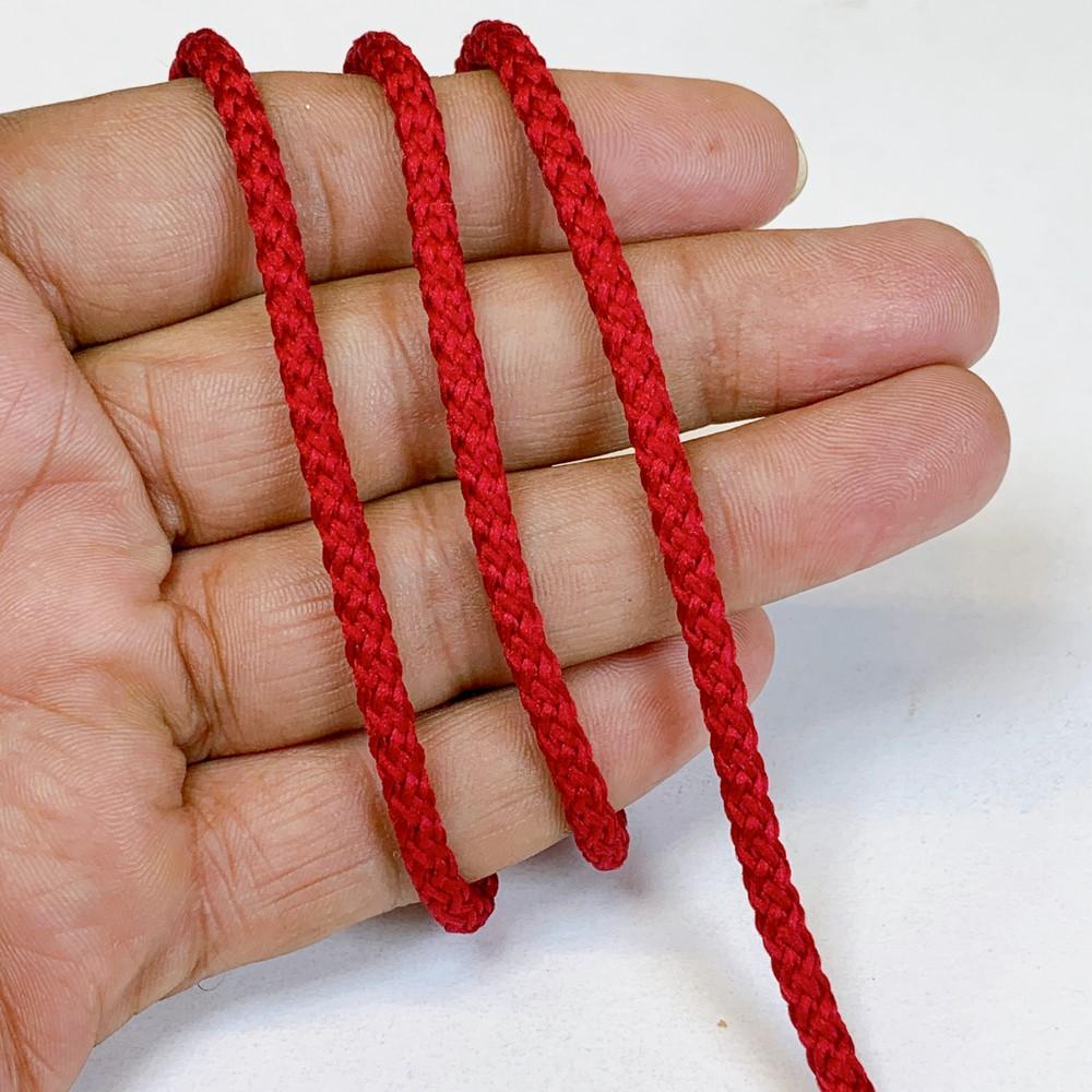 4mm Indian Braided Dori String - Multicolored Drawstring Cord for Ethnic Wear, Latkans, and Tassels, shown on white cotton
