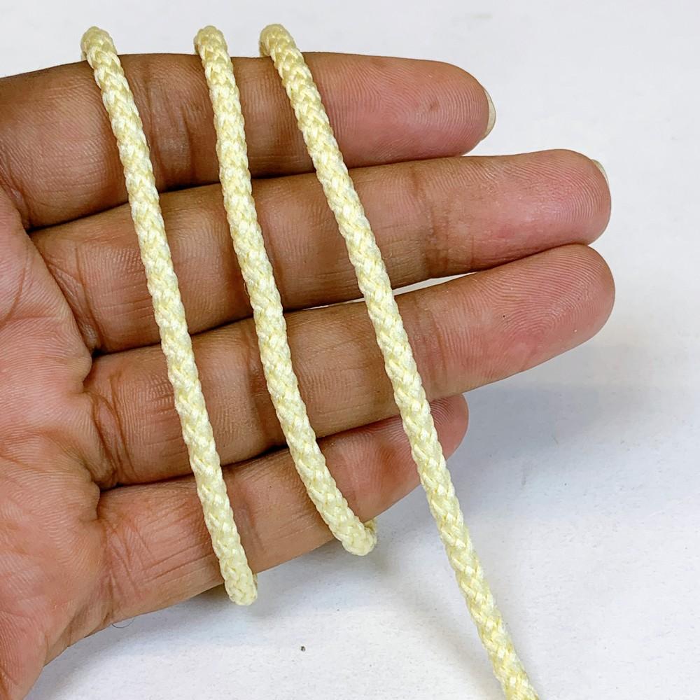 4mm Indian Braided Dori String - Multicolored Drawstring Cord for Ethnic Wear, Latkans, and Tassels, shown on white cotton