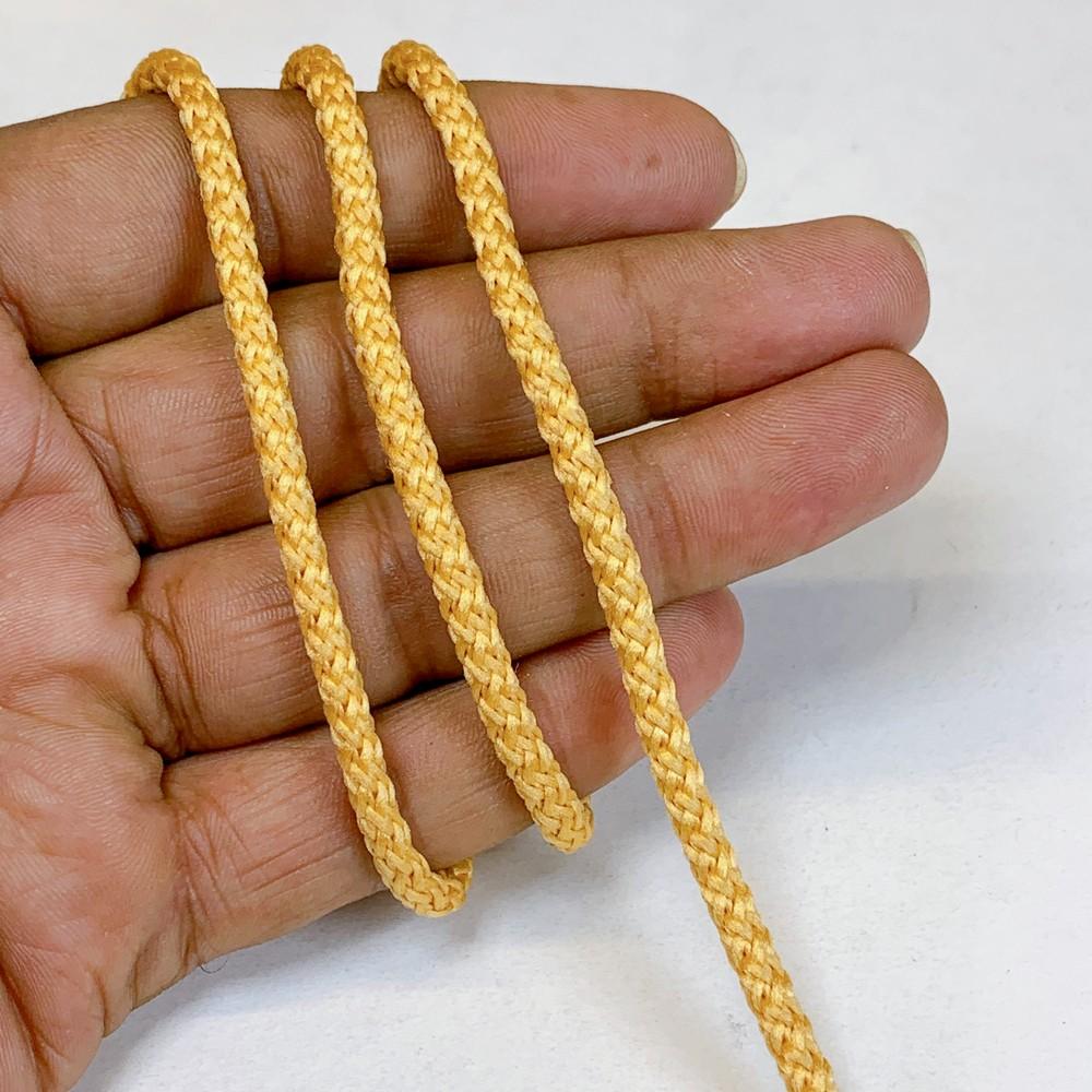 4mm Indian Braided Dori String - Multicolored Drawstring Cord for Ethnic Wear, Latkans, and Tassels, shown on white cotton
