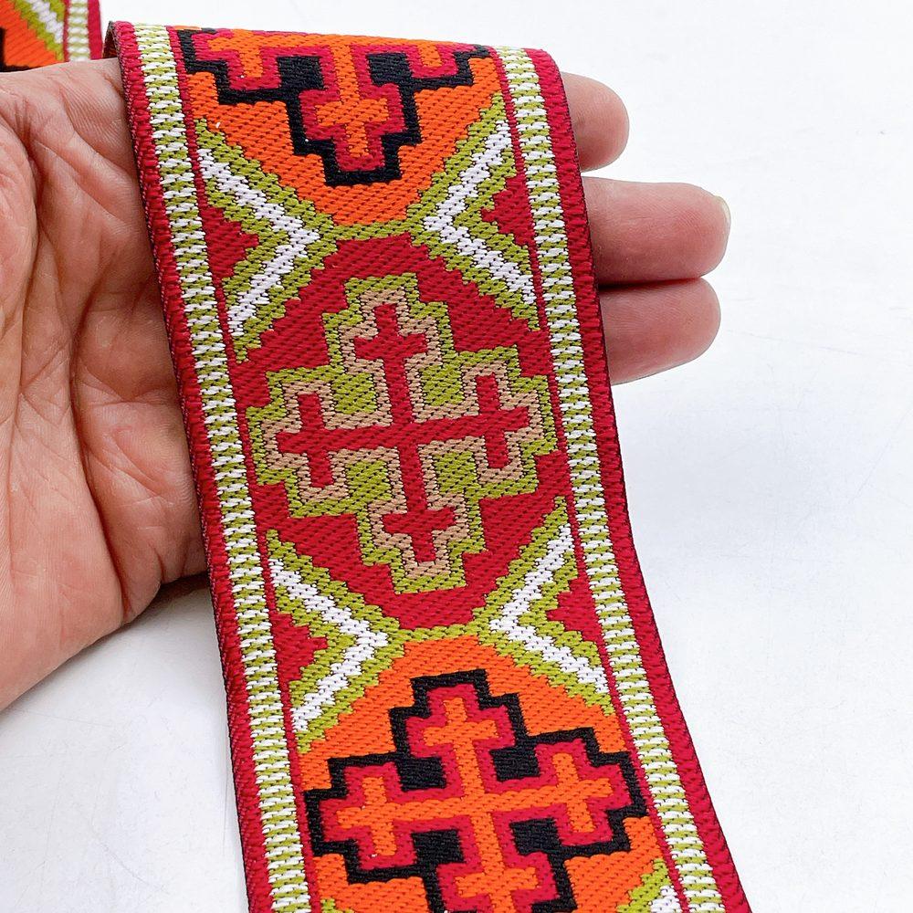 65mm Wide Tribal Jacquard Ribbon Trim - Colorful Geometric Tapestry Border for Bag Straps and Apparel, shown on white cotton