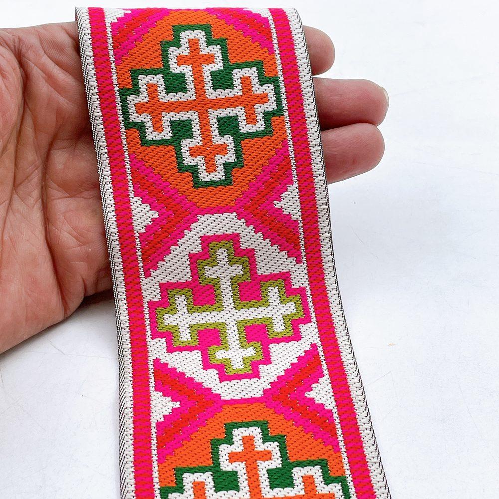 65mm Wide Tribal Jacquard Ribbon Trim - Colorful Geometric Tapestry Border for Bag Straps and Apparel, shown on white cotton