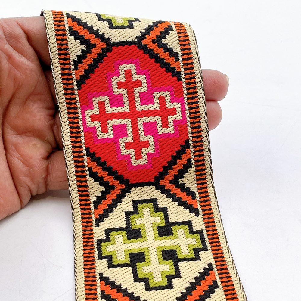 65mm Wide Tribal Jacquard Ribbon Trim - Colorful Geometric Tapestry Border for Bag Straps and Apparel, shown on white cotton