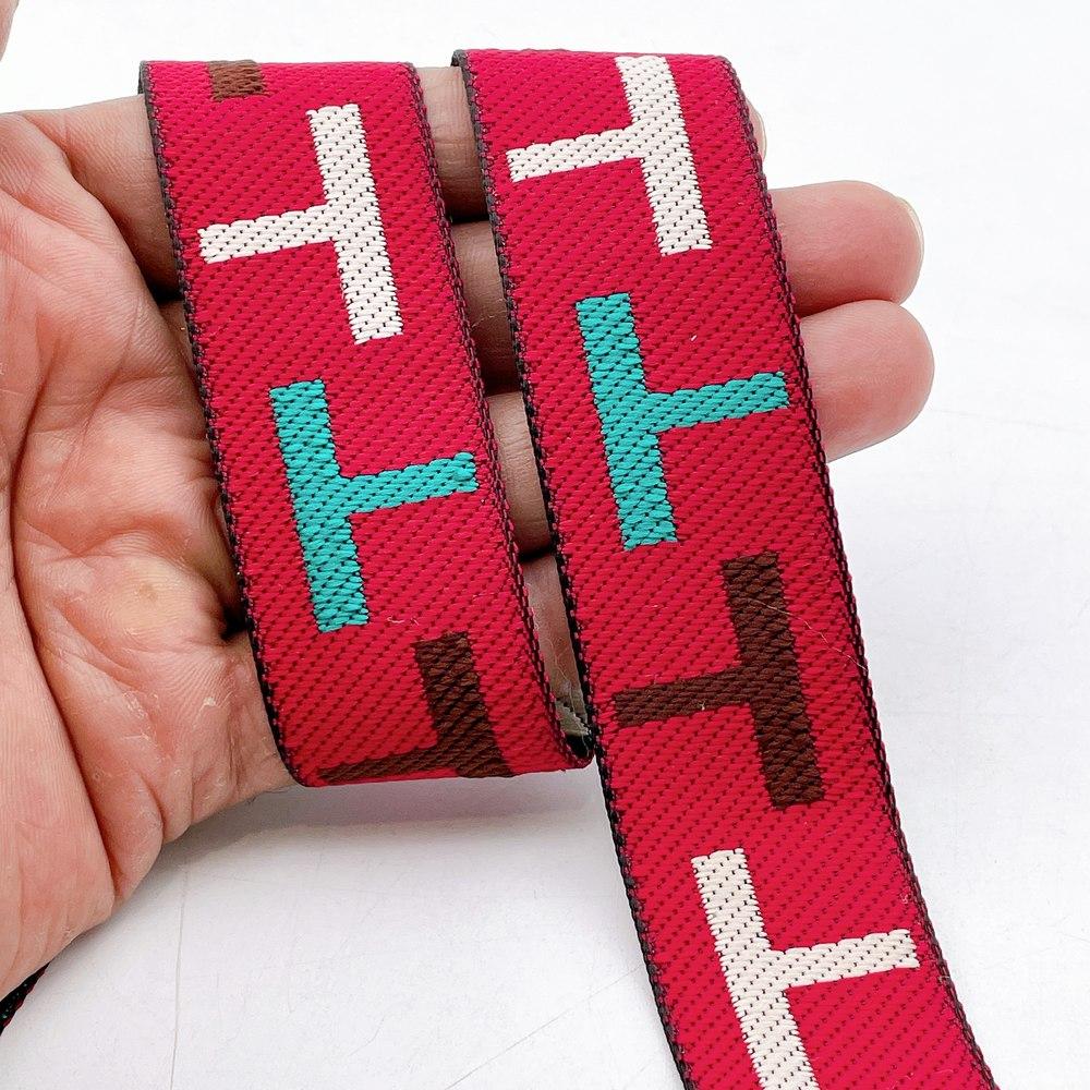 28mm Sporty Geometric Jacquard Ribbon Trim - Woven 'T' Pattern Tape for Apparel and Bag Straps, shown on white cotton