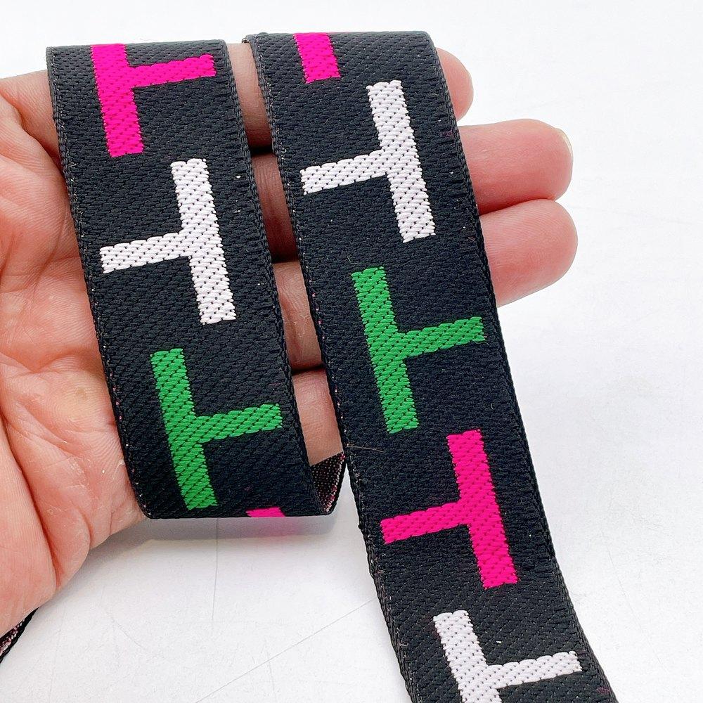 28mm Sporty Geometric Jacquard Ribbon Trim - Woven 'T' Pattern Tape for Apparel and Bag Straps, shown on white cotton