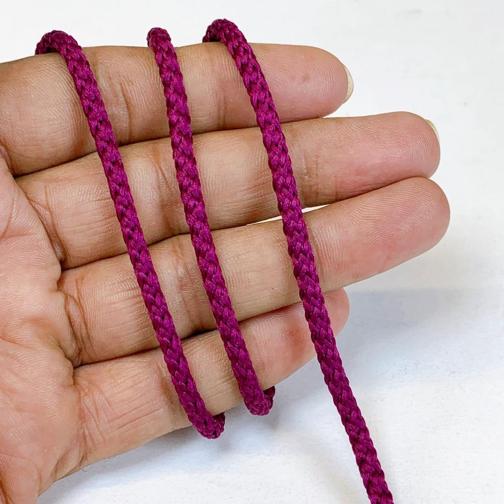4mm Indian Braided Dori String - Multicolored Drawstring Cord for Ethnic Wear, Latkans, and Tassels, shown on white cotton