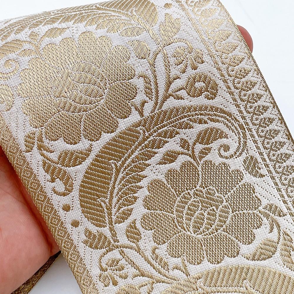 95mm Viscose Dyeable Jacquard Ribbon Trim - Customizable Woven Floral Border for Ethnic Wear, shown on white cotton