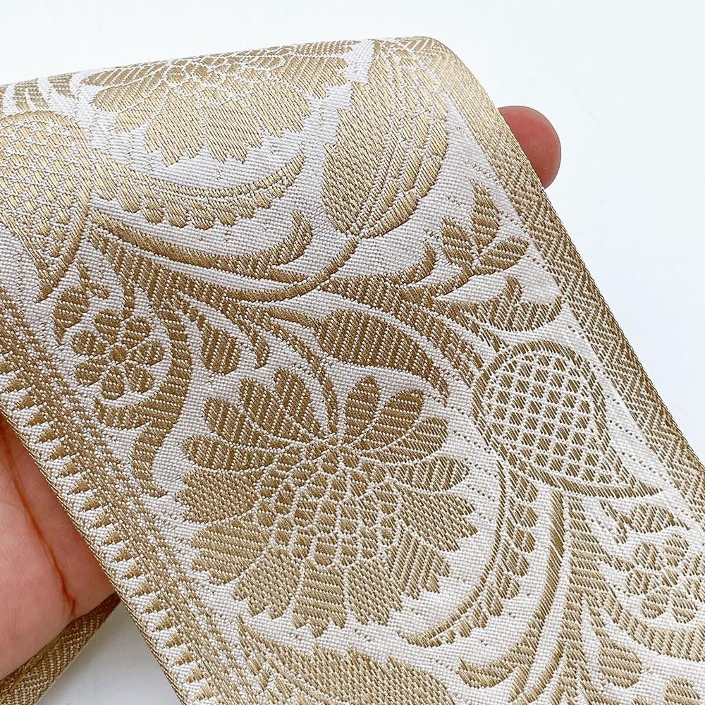 95mm Wide Floral Motif Dyeable Lace Tape - Ready-to-Dye Zari Trim for Sarees and Lehengas, shown on white cotton
