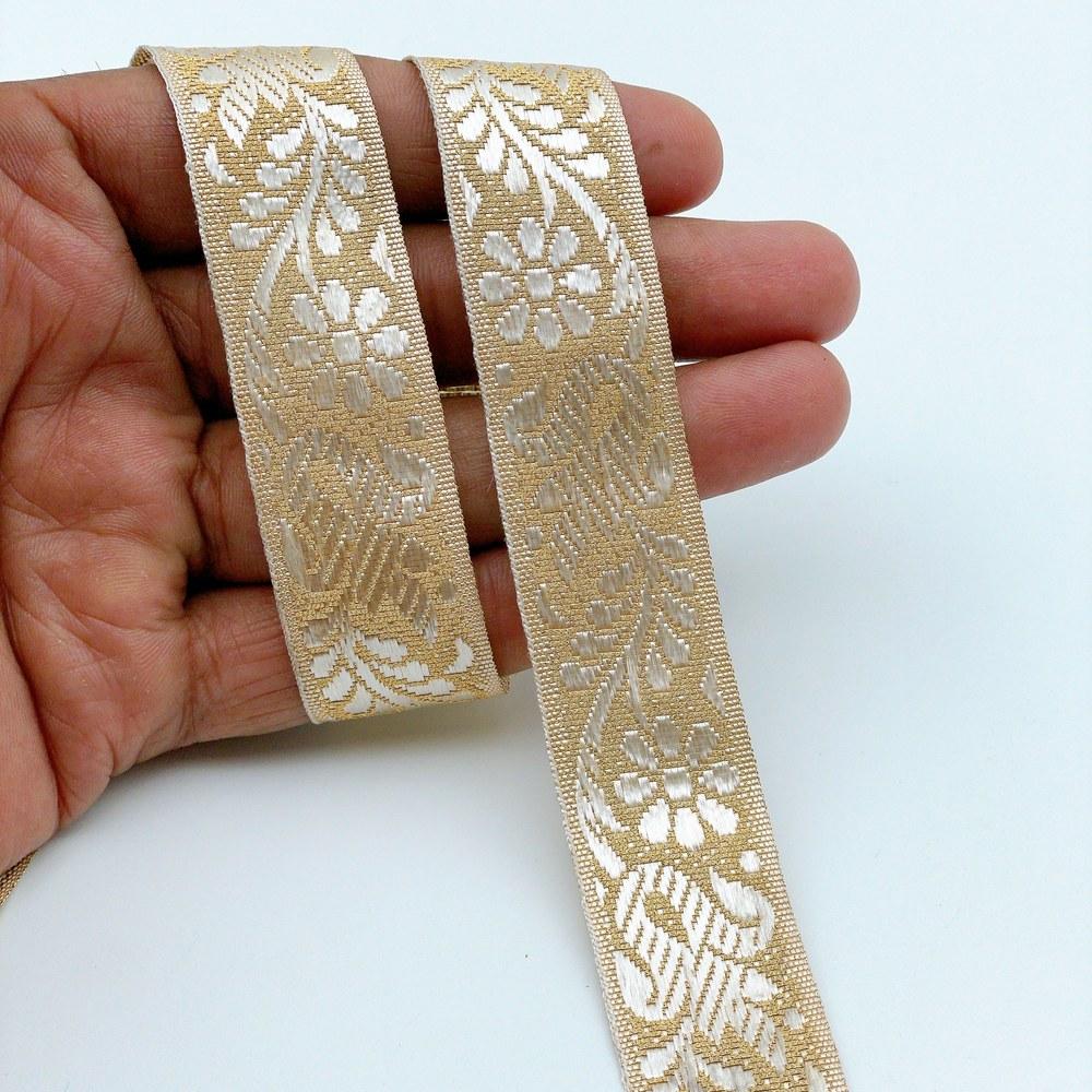 22mm Ready-to-Dye Botanical Lace Tape - Woven Trim for Sarees, Apparel, and Crafts, shown on white cotton