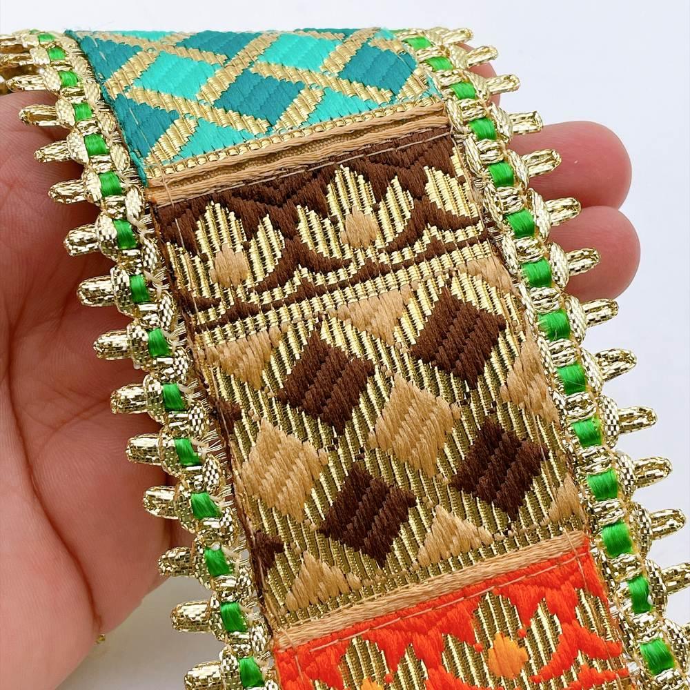 70mm Heavy Indian Bridal Brocade Border with Gold Fringe - Woven Floral Trim for Lehengas, shown on white cotton