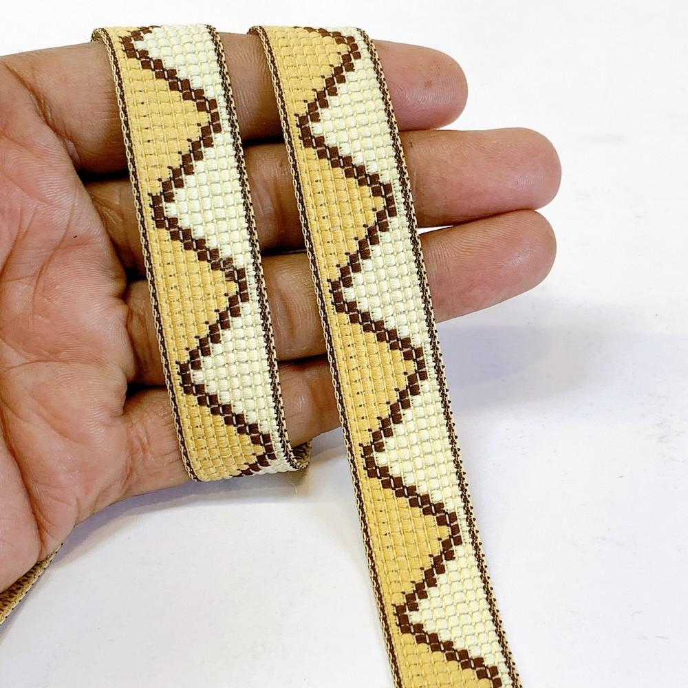 19mm Geometric Cross-Stitch Tape - Multicolor Border for Sewing and Home D�cor, shown on white cotton