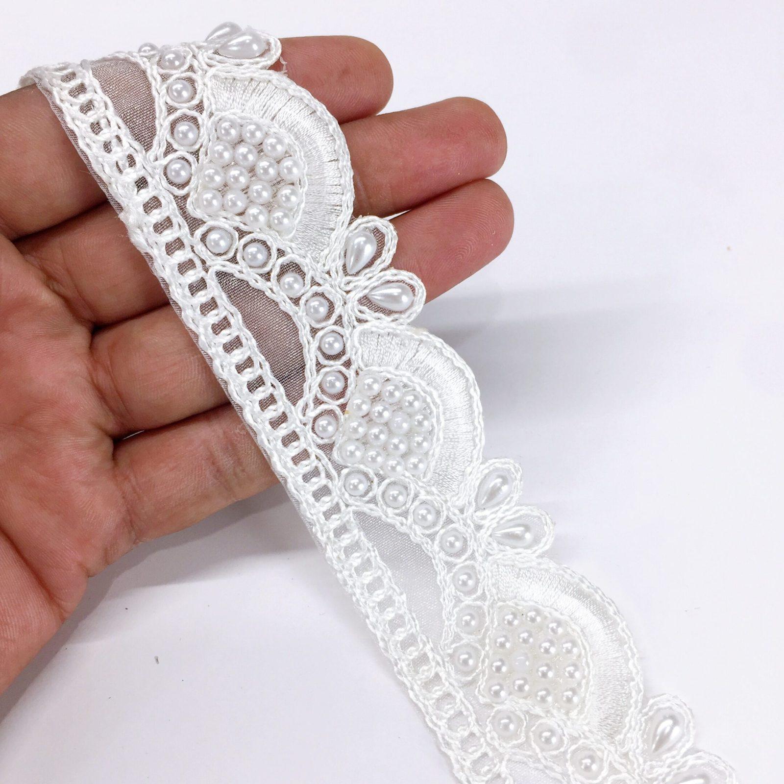 40mm Embroidery Cutwork work Lace with White Moti Beads Work Border, shown on white cotton