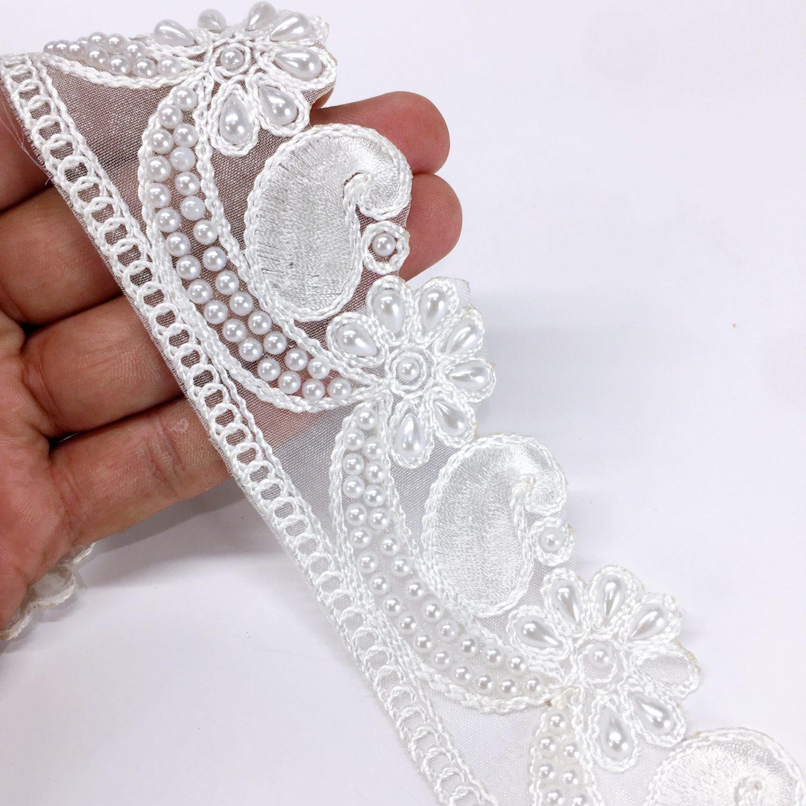 50mm Flower Design White Embroidery Cutwork work Lace with White Moti Beads Work Border, shown on white cotton