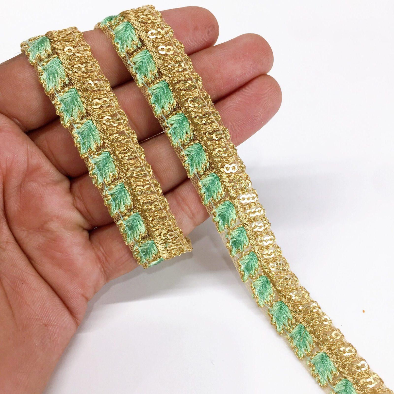 15mm Leaf Design Embroidery lace with Golden Sequins Work Border, shown on white cotton