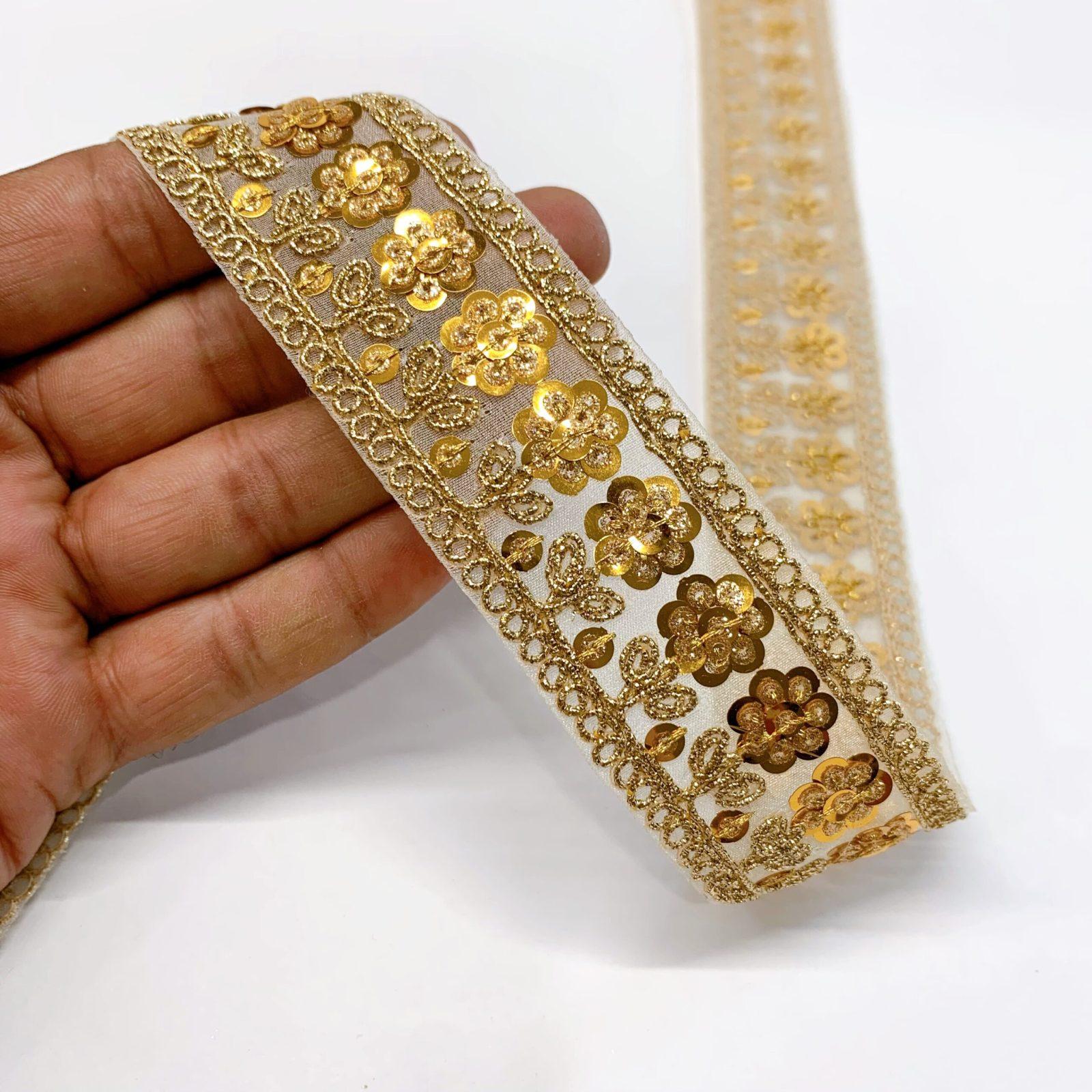 30mm Embroidery Golden Sequins Flower Design Dori Work, shown on white cotton