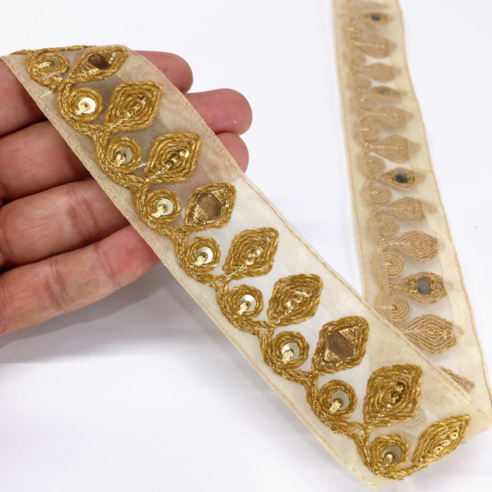30mm New Design Embroidery Golden Dori Work, Sequins and Mirror Work Trim, shown on white cotton