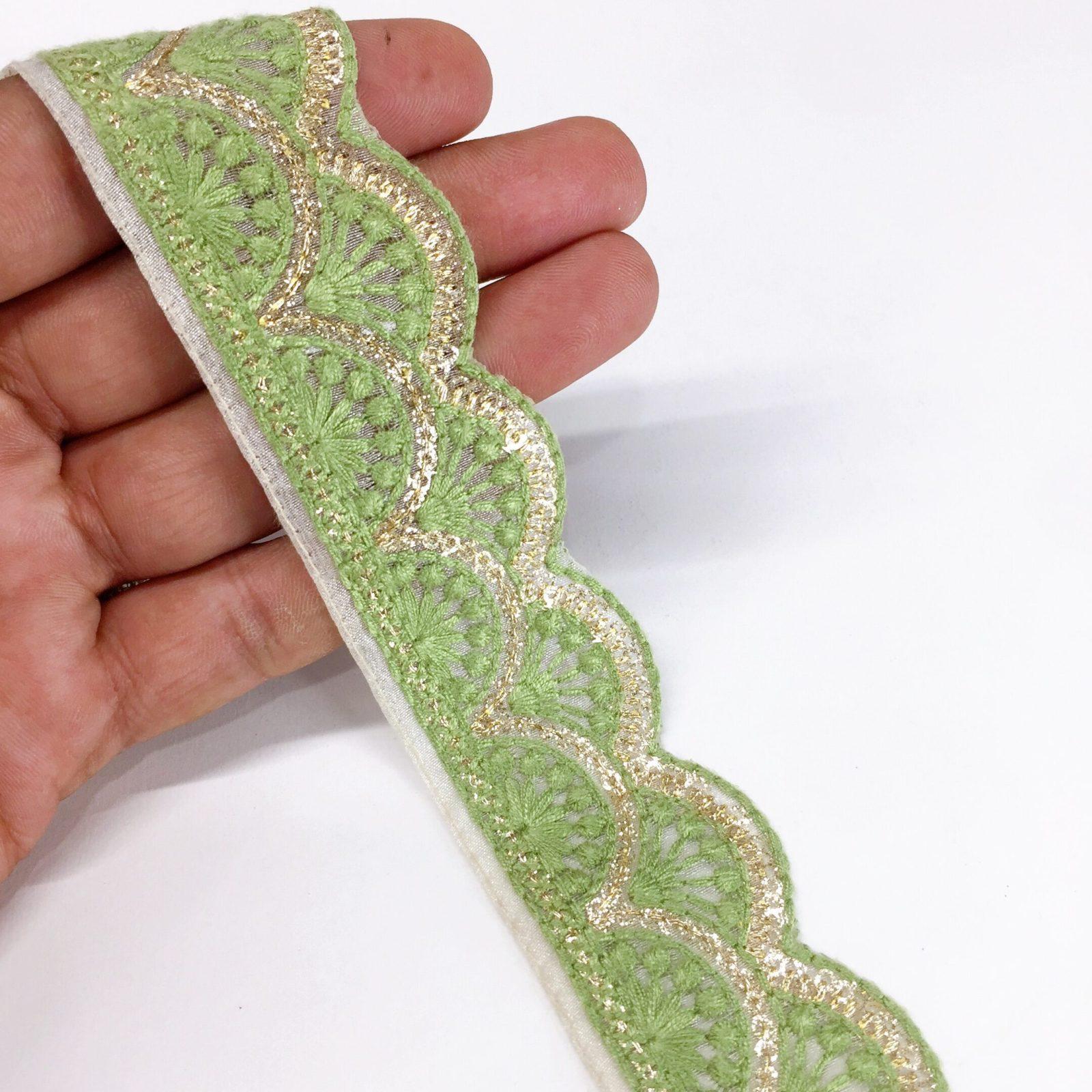 30mm Cutwork Design Embroidery Lace With Double Sequins Line Work, shown on white cotton