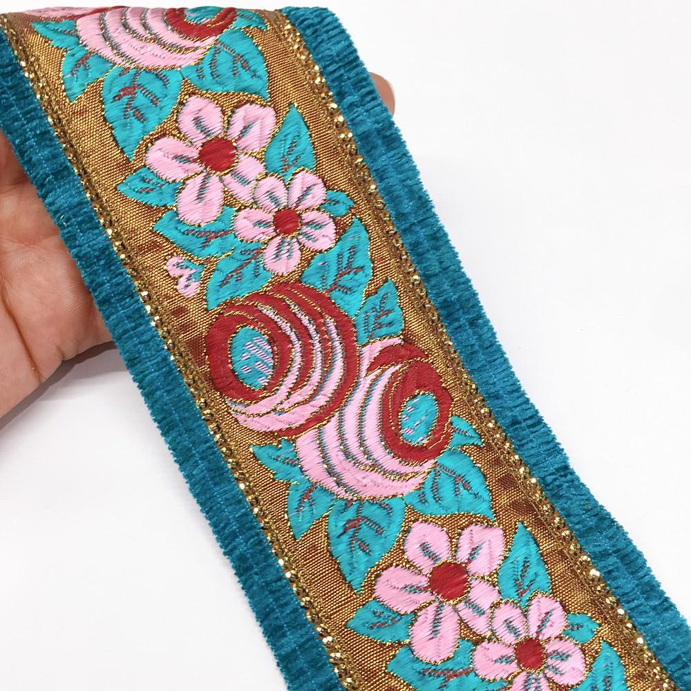 80mm Sky Blue grey flower design with velvet and sequin, shown on white cotton