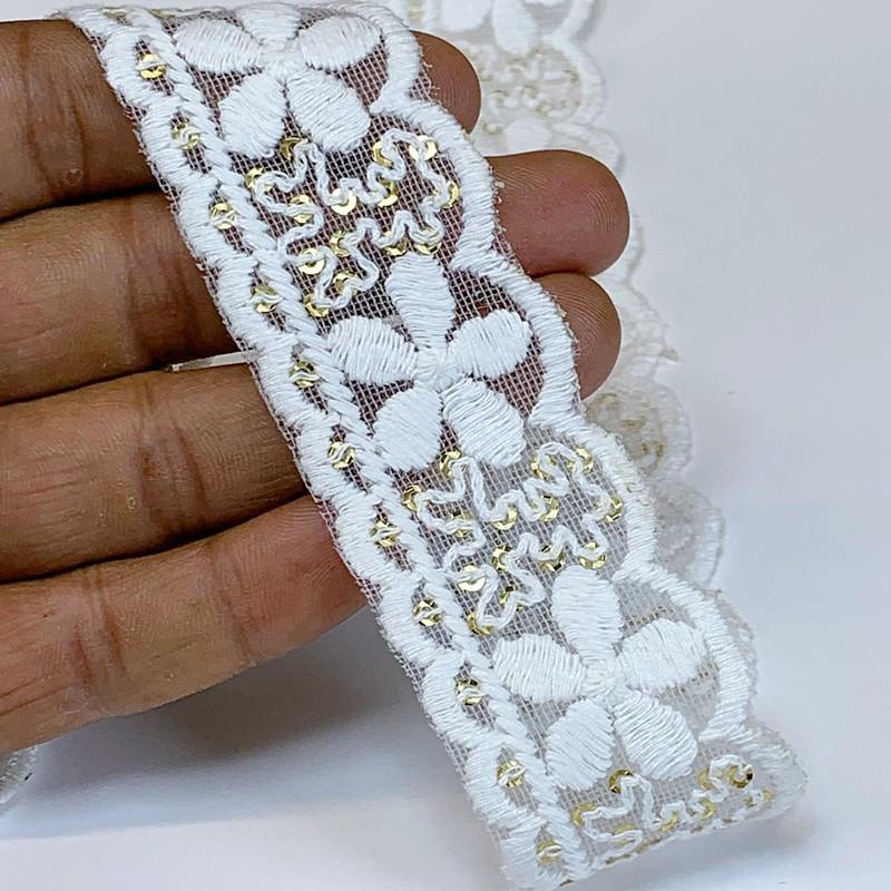 35mm Cotton Embroidery With Sequins, shown on white cotton