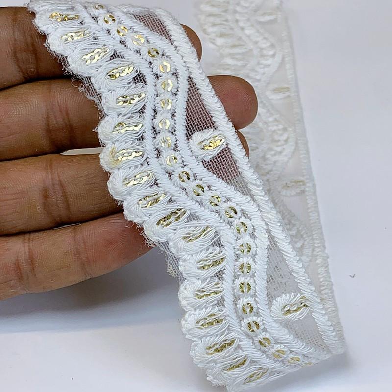 35mm Cotton Embroidery With Sequins, shown on white cotton