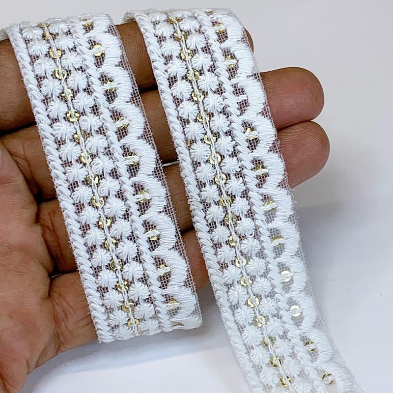 25mm Cotton Embroidery With Sequins, shown on white cotton