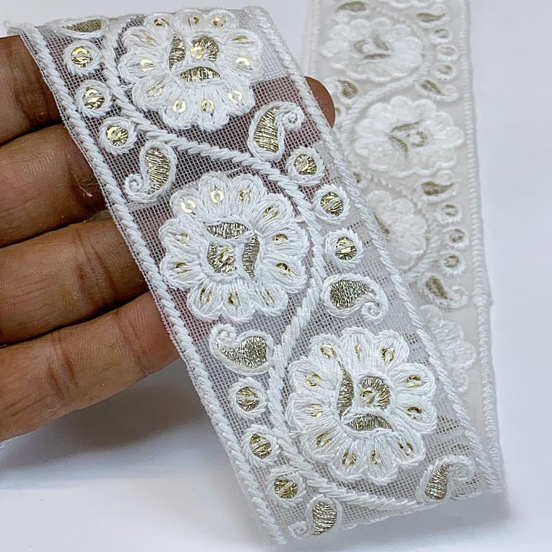 50mm Cotton Embroidery With Sequins, shown on white cotton