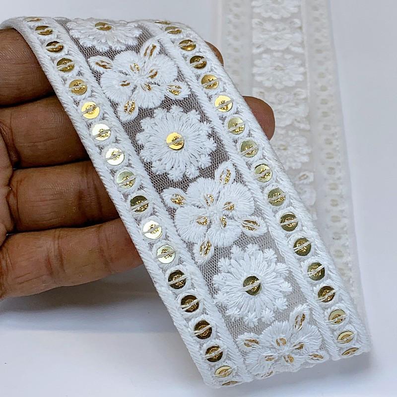 50mm Cotton Embroidery With Sequins, shown on white cotton