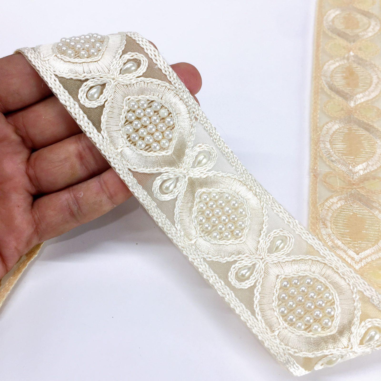 45mm Dori Work Embroidery Lace with Cream Moti Beads Work Border, shown on white cotton