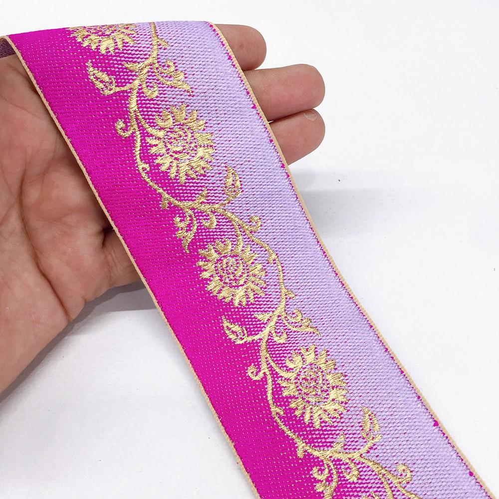 55mm shaded Jacquard Creeper Flower Design, shown on white cotton