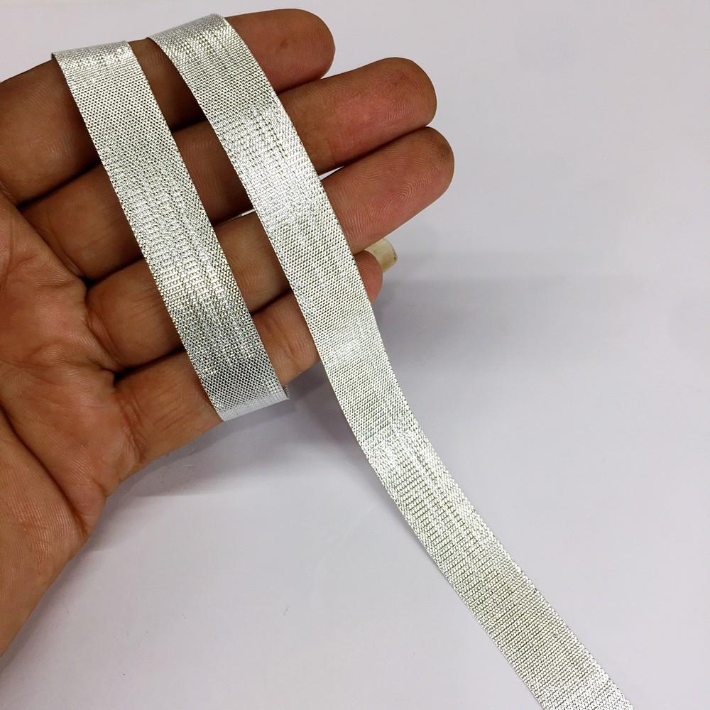12 mm Metallic Shiny Plain Gota Ribbon, shown on white cotton