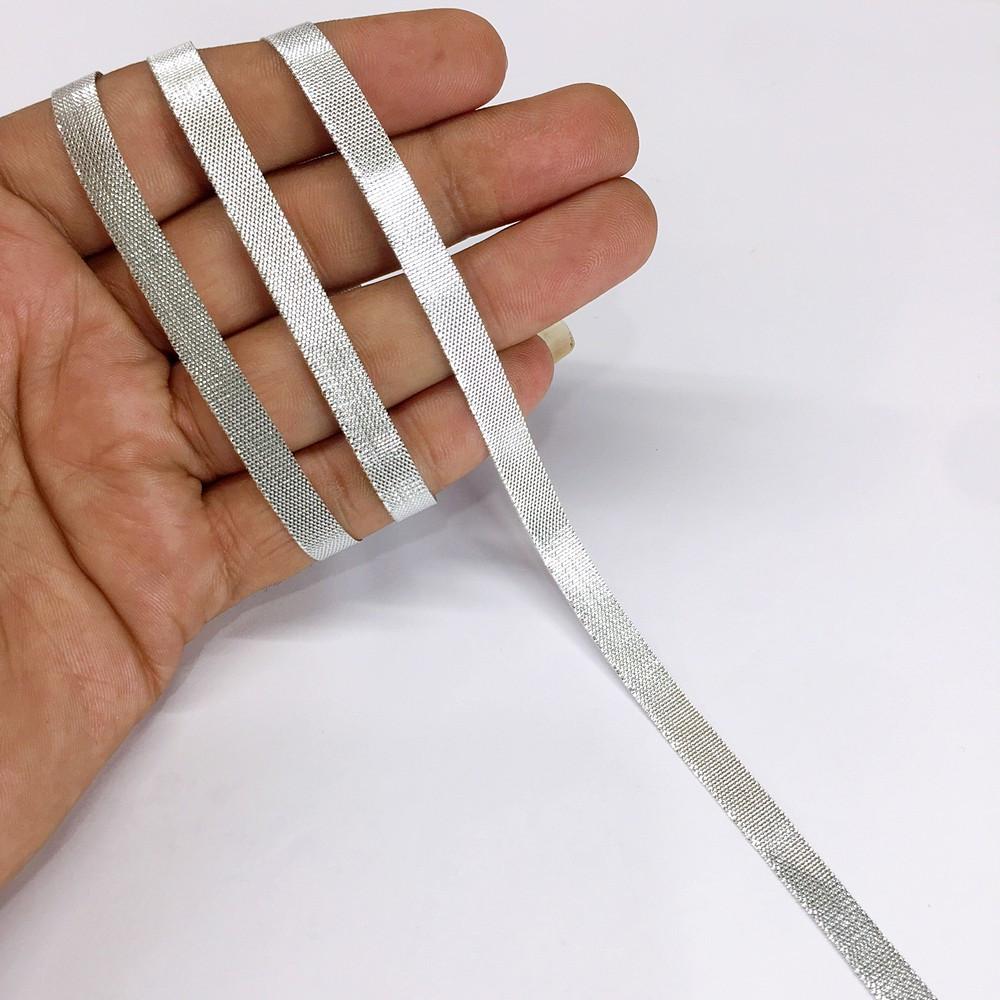7 mm Metallic Shiny Plain Gota Ribbon, shown on white cotton