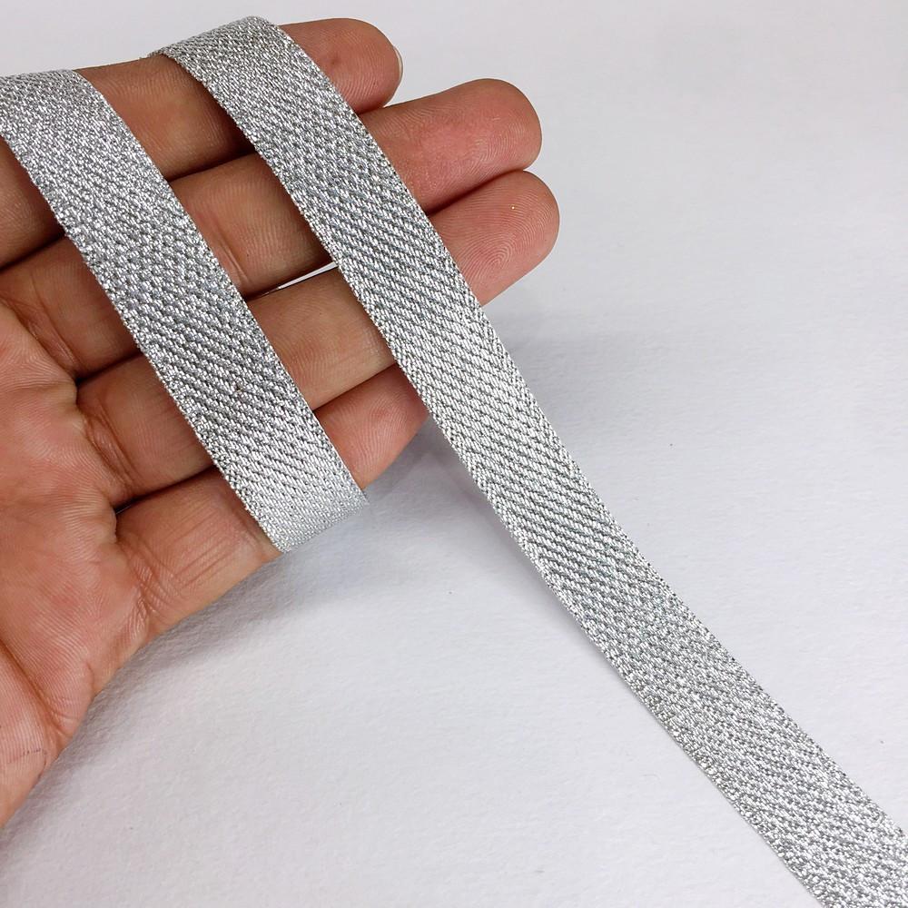 15 mm Metallic Glitter Twill Weave Ribbon, shown on white cotton